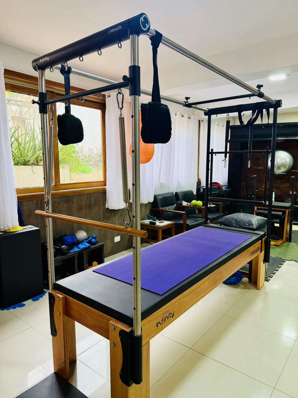 Equipamento Cadillac do studio de Pilates